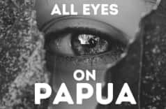 Foto hitam putih sebuah mata dengan tulisan semua mata memandang Papua